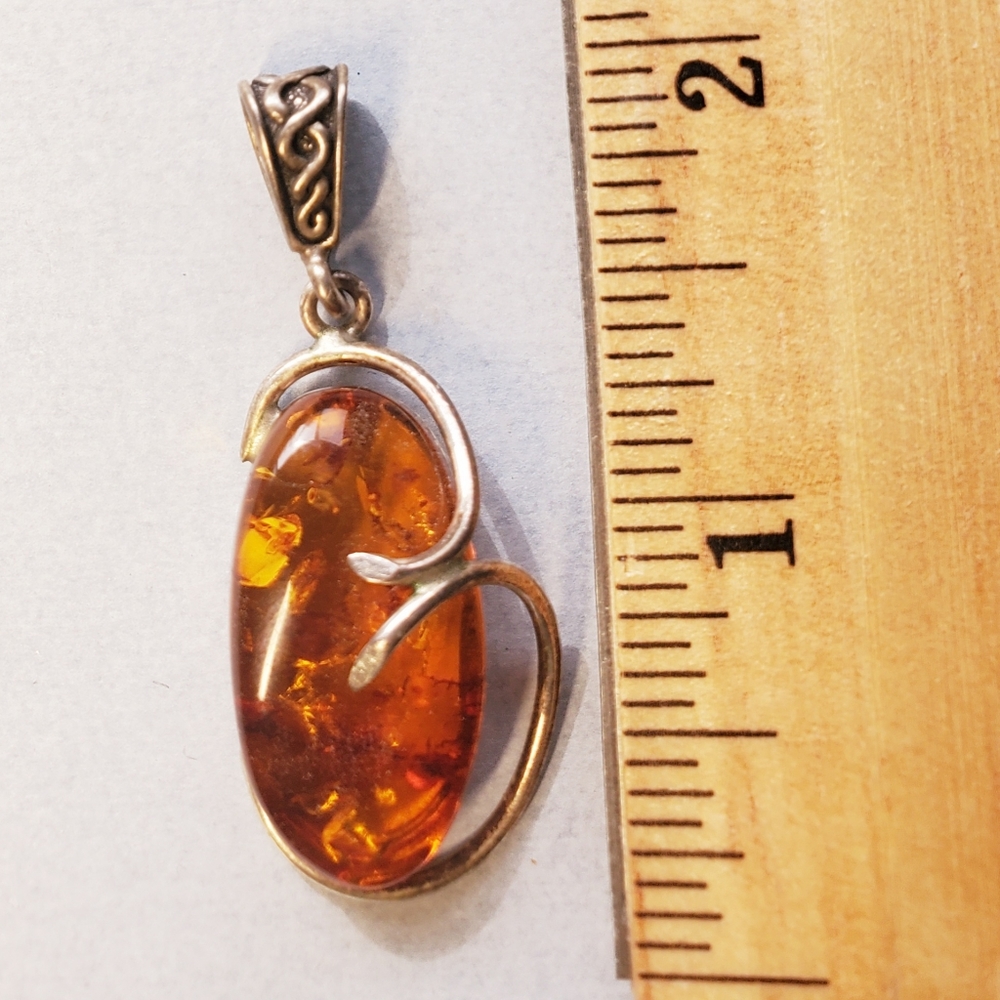 Amber and sterling silver pendant